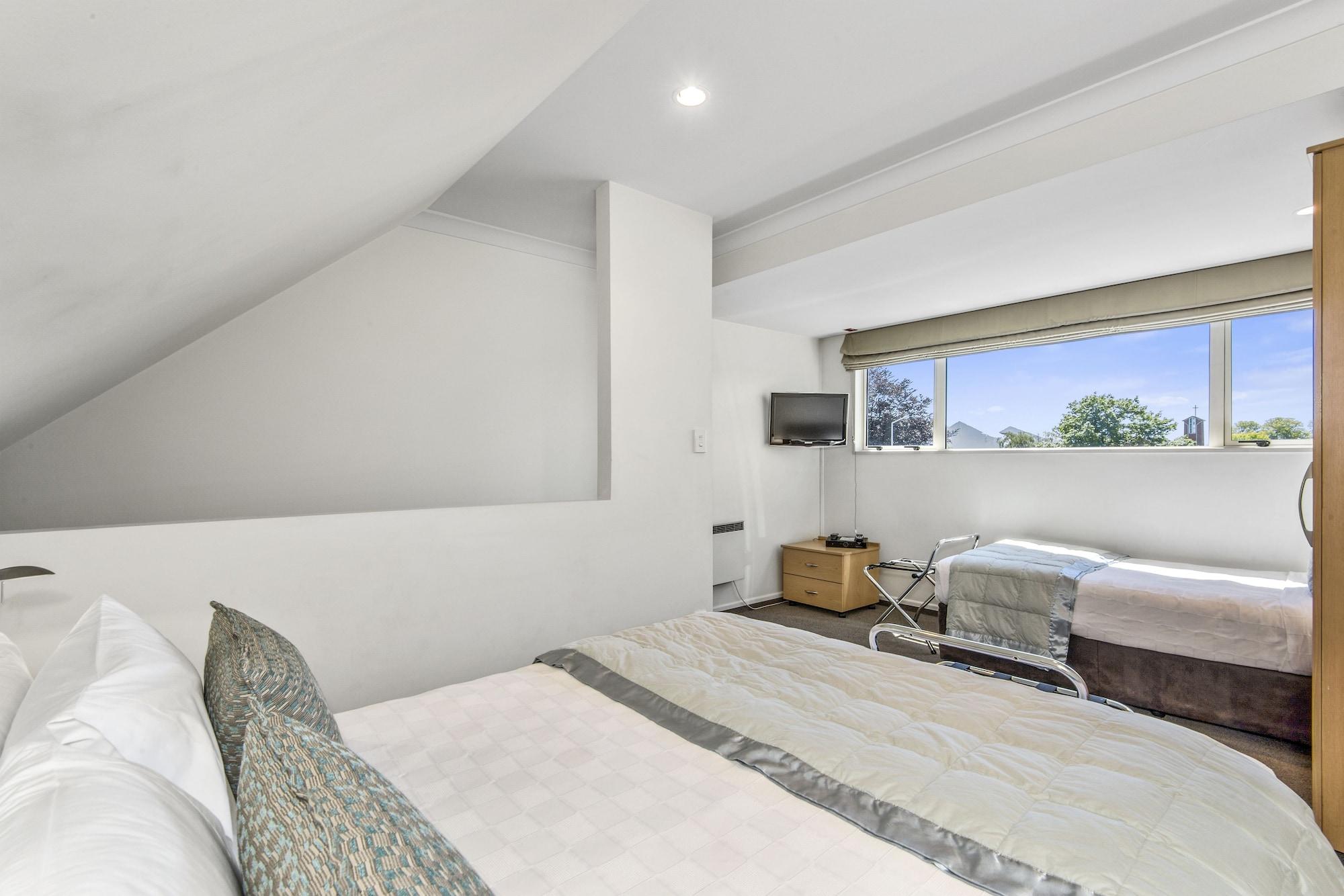 Colombo In The City Christchurch Bagian luar foto A room at the hotel