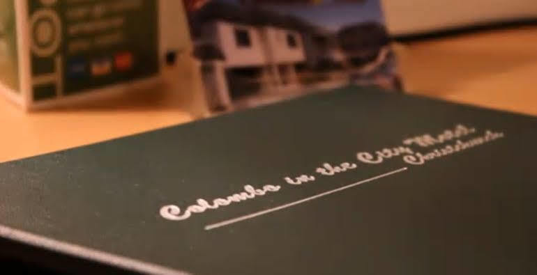 Colombo In The City Christchurch Bagian luar foto A book with a dedication