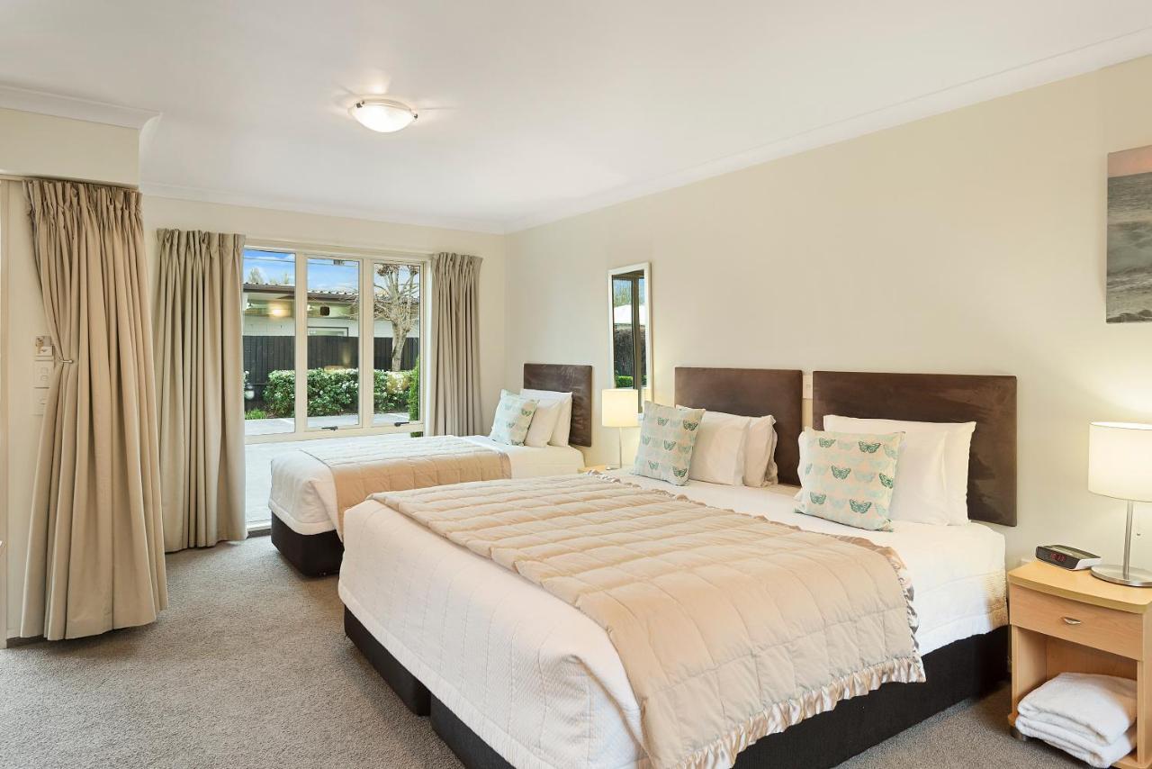 Colombo In The City Christchurch Bagian luar foto A typical bedroom at the hotel